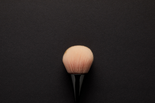 top view of makeup brush for permanent makeup isolated on black