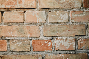 full frame image of old brick wall with cement background