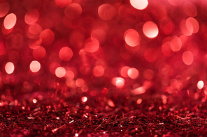 christmas background with red bright blurred confetti
