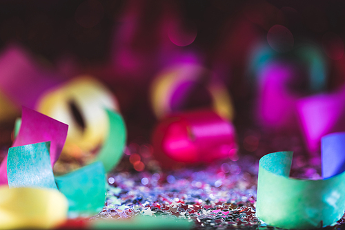 christmas confetti and shiny stars with blurred background