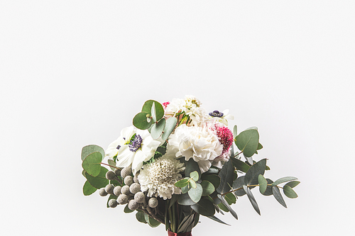 close up view of beautiful bridal bouquet isolated on grey
