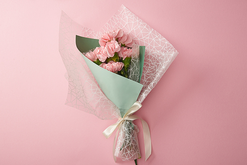 top view of beautiful tender flower bouquet isolated on pink