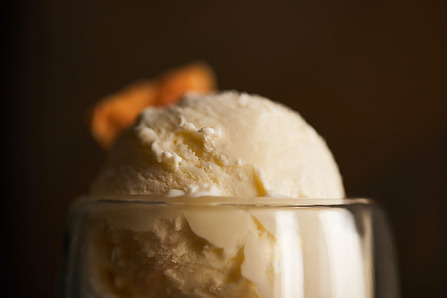 selective focus of delicious ice cream scoop in glass