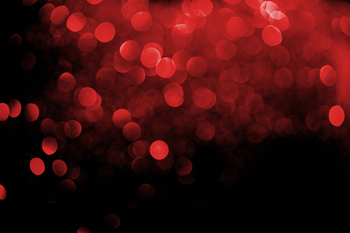 abstract decorative background with blurred red glitter