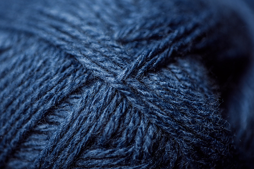 full frame of blue yarn texture as background
