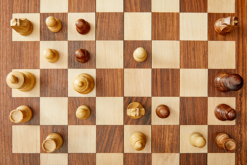 top view of wooden chess board with chess