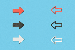 top view of opposite horizontal red| white and black arrows on blue background