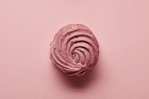 Top view of soft pink zephyr in center on pink background