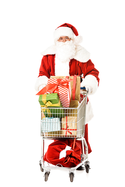 santa claus with shopping cart full of gift boxes  isolated on white