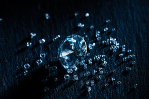 big and small diamonds on dark background