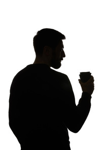 Silhouette of man holding paper cup of coffee isolated on white