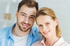 Portrait of young smiling caucasian couple