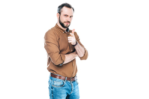 handsome bearded man pointing at camera with finger isolated on white
