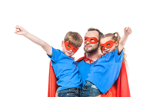 super father with children in masks and cloaks pretending to be superheroes isolated on white