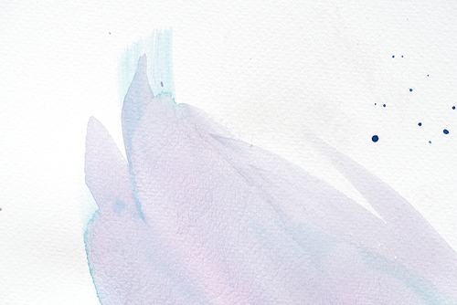 abstract violet and blue watercolor strokes on white paper