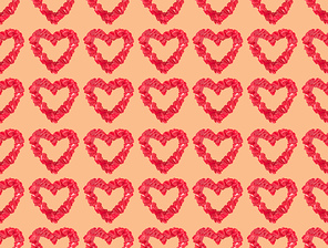 seamless pattern from beautiful decorative red hearts on orange background