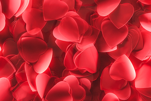 close-up view of romantic decorative red heart shaped petals, valentines day background