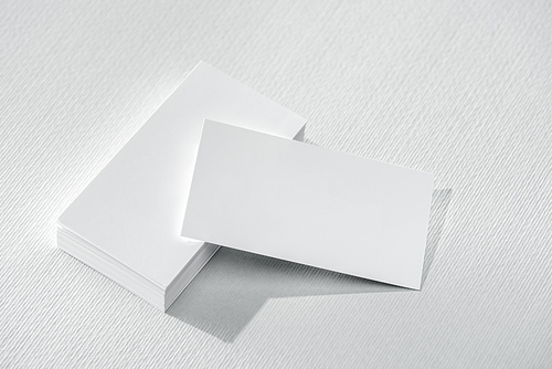 blank cards on white surface with copy space