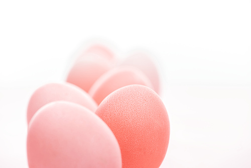 selective focus of pastel pink easter eggs