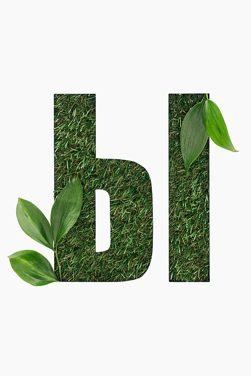 cut out cyrillic letter made of grass with green leaves isolated on white