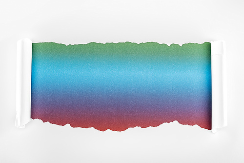 ragged white paper with curl edges on multicolored background