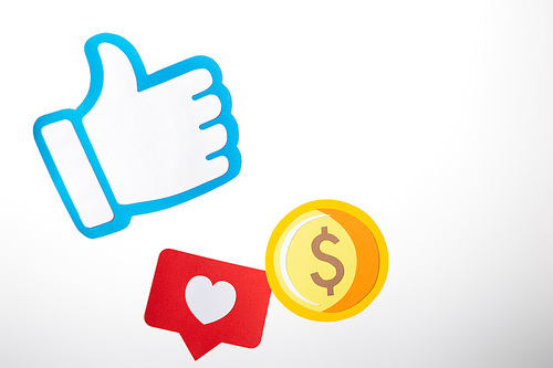 colorful paper icons with coin, heart and thumb up on white background