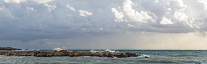 panoramic shot of mediterranean sea against sky with clouds