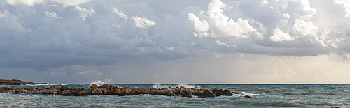 panoramic shot of mediterranean sea against sky with clouds
