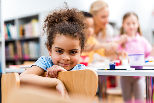 selective focus of happy african american kid 