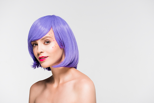 beautiful naked girl in purple wig isolated on grey