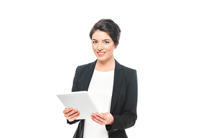 beautiful mixed race businesswoman holding digital tablet and smiling at camera isolated on white