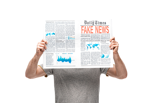 man in grey t-shirt holding newspaper with fake news isolated on white