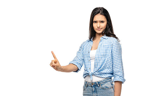 skeptical girl pointing with finger Isolated On White with copy space