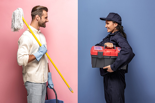man in rubber gloves with mop and woman in construction worker uniform with tool box on blue and pink