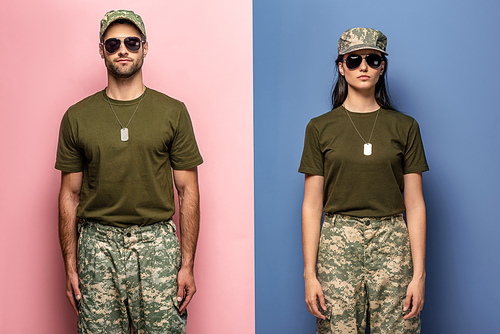 man and woman in military uniform and sunglasses on blue and pink