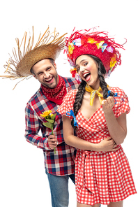 cheerful man and young woman in festive clothes with sunflower isolated on white