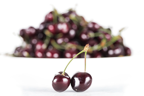 selective focus of red, fresh and sweet cherries