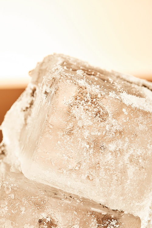 stack of textured frosted ice cubes on illuminated background