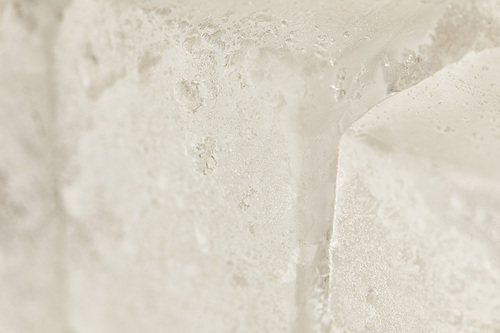 close up view of frozen fresh textured ice cubes