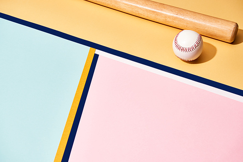 Baseball bat and ball on colorful background with lines