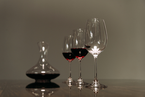 wine glasses with wine and jug in restaurant