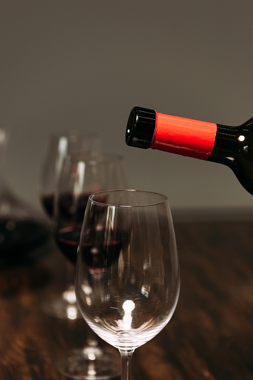 bottle of wine and wine glasses in restaurant