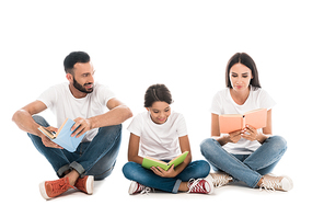 smiling family reading books while sitting isolated on white