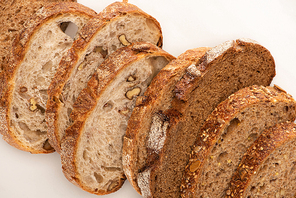 fresh whole wheat bread slices on white background