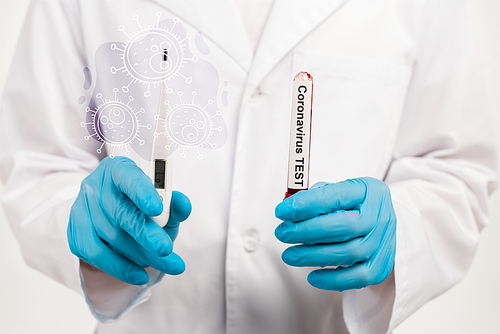 cropped view of scientist holding sample with coronavirus test lettering and digital thermometer near illustration of coronavirus on white