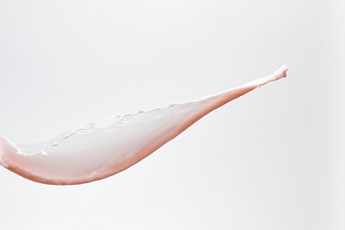 fresh pink milk splash isolated on white