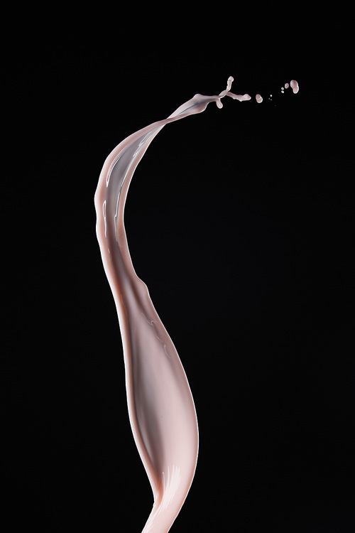smooth fresh pink milk splash isolated on black