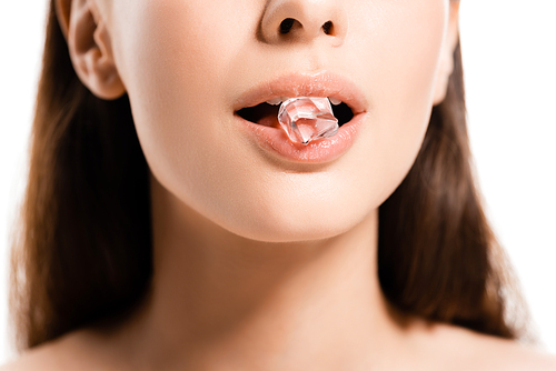 cropped view of young naked woman holding ice cube in mouth isolated on white