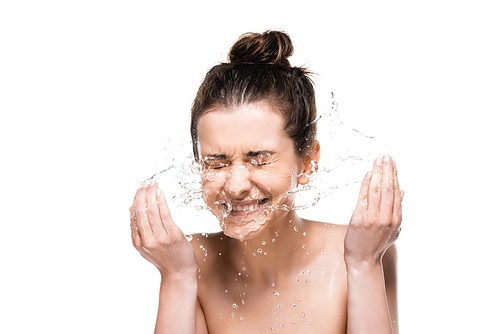 happy naked young brunette woman with natural beauty washing up with clean water splash isolated on white