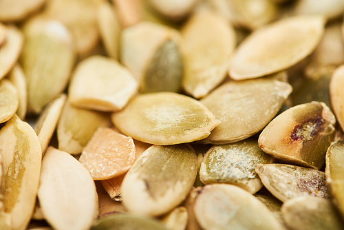 close up view of roasted organic pumpkin seeds